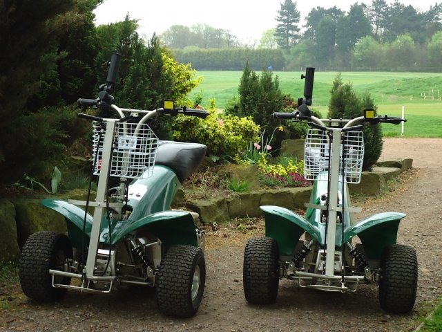 Two G3 golf scooters